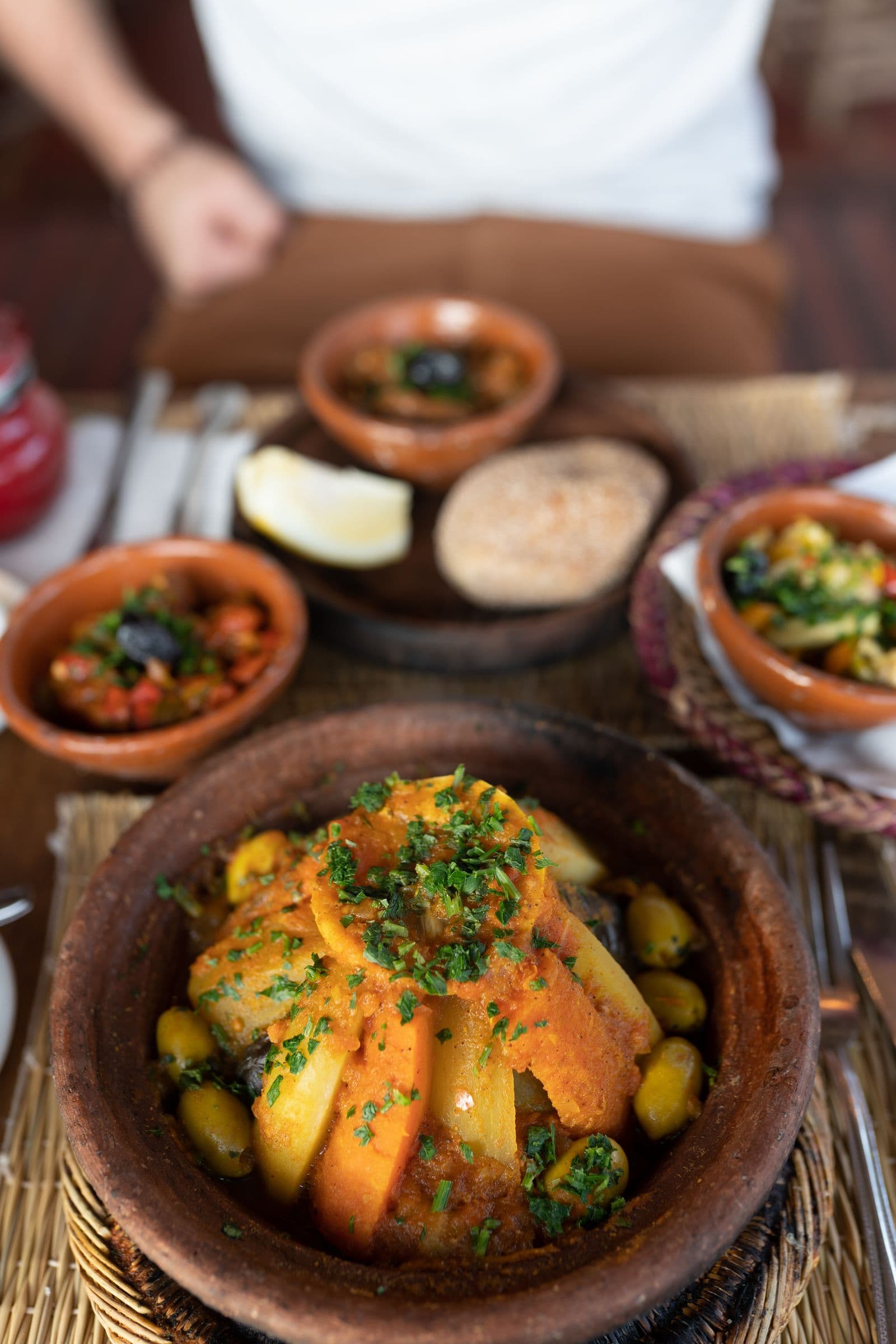 Traditional Moroccan chicken tagine with olives and preserved lemon at Riad Fez Mahal
